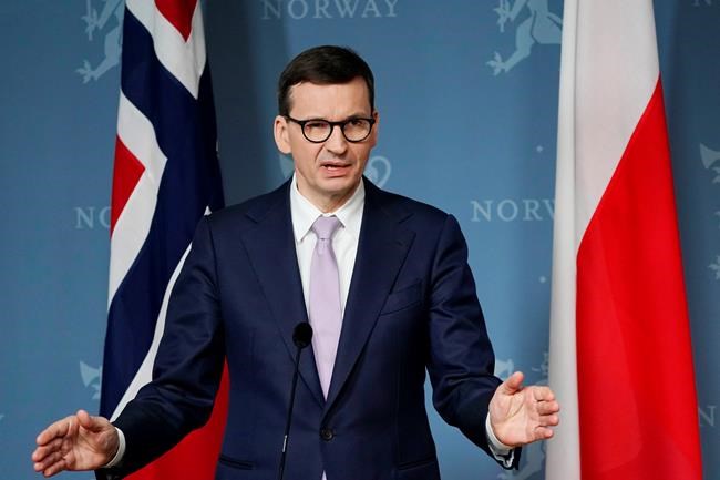 Polish Prime Minister Mateusz Morawiecki holds a joint press conference with Norway's Prime Minister Jonas Gahr Støre in the Government's official residence in Oslo, Tuesday, March 8, 2022. (Stian Lysberg Solum/NTB via AP)