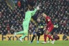Inter Milan's goalkeeper Samir Handanovic, left, collects the ball during the Champions League, round of 16, second leg soccer match between Liverpool and Inter Milan at Anfield stadium in Liverpool, England, Tuesday, March 8, 2022. (AP Photo/Jon Super)