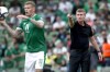 FILE - Ireland coach Stephen Kenny, right, points as Ireland's James McClean holds the ball during the World Cup 2022 group A qualifying soccer match between Ireland and Azerbaijan at Aviva stadium in Dublin, Ireland, Saturday, Sept. 4, 2021. Ireland coach Stephen Kenny's “big dream” is to qualify for the 2024 European Championship now that he's signed a contract extension. Kenny discussed his goals for Ireland at a press conference on Thursday, March 10, 2022, a day after he was given an extension through the Euro 2024 being held in Germany. (AP Photo/Peter Morrison, File)
