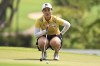 Xiyu Janet Lin of China lines up her shot on 15th hole during the third round of the LPGA Honda Thailand golf tournament in Pattaya, southern Thailand, Saturday, March 12, 2022. (AP Photo/Kittinun Rodsupan)
