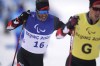 Canada's Brian McKeever and his guide Graham Nishikawa compete during the men's middle distance free technique vision impaired event of para cross country skiing at the 2022 Winter Paralympics in Zhangjiakou, China, Saturday, March 12, 2022. McKeever won his 16th Paralympic gold medal today. THE CANADAIN PRESS/AP-Shuji Kajiyama