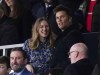 Former American football quarterback Tom Brady, right, looks on from the stands, prior to the English Premier League soccer match between Manchester United and Tottenham Hotspur, at the Old Trafford stadium, in Manchester, England, Saturday, March 12, 2022. (Martin Rickett/PA via AP)