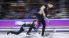 Team Wild Card One skip Brad Gushue, left, makes a shot as second Brett Gallant scores on during semi-final action against Team Saskatchewan at the Tim Hortons Brier in Lethbridge, Alta., Saturday, March 12, 2022. THE CANADIAN PRESS/Jeff McIntosh