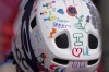 Drawing are seen on the helmet of Jasmin Bambur of the United States as he competing in the men's slalom, sitting at the 2022 Winter Paralympics, Sunday, March 13, 2022, in the Yanqing district of Beijing. (AP Photo/Andy Wong)