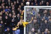 Wolverhampton Wanderers' Raul Jimenez attempts an overhead shot on goal during their English Premier League soccer match against Everton at Goodison Park, Liverpool, England, Sunday, March 13, 2022. (Martin Rickett/PA via AP)