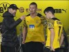 Dortmund's head coach Marco Rose talks with Dortmund's Erling Haaland and Dortmund's Giovanni Reyna, from left, during the German Bundesliga soccer match between Borussia Dortmund and Arminia Bielefeld in Dortmund, Germany, Sunday, March 13, 2022. (AP Photo/Martin Meissner)