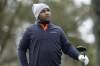 Harold Varner III watches his tee shot on the ninth hole during the second round of play in The Players Championship golf tournament Sunday, March 13, 2022, in Ponte Vedra Beach, Fla. (AP Photo/Lynne Sladky)