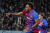 Barcelona's Pierre-Emerick Aubameyang celebrates after scoring during a Spanish La Liga soccer match between FC Barcelona and Osasuna at the Camp Nou stadium in Barcelona, Spain, Sunday, March 13, 2022. (AP Photo/Joan Monfort)