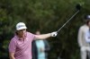 Cameron Smith, of Australia, reacts to an errant tee shot on the 15th hole during the final round of play in The Players Championship golf tournament Monday, March 14, 2022, in Ponte Vedra Beach, Fla. (AP Photo/Lynne Sladky)