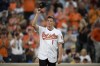 FILE - Baltimore Orioles first-round draft pick Adley Rutschman tips his cap to the crowd as he was introduced between innings of a baseball game against the San Diego Padres, Tuesday, June 25, 2019, in Baltimore. Orioles catcher Adley Rutschman, Kansas City Royals shortstop Bobby Witt Jr. and Detroit Tigers infielder Spencer Torkelson are among baseball's most intriguing rookies this summer. (AP Photo/Nick Wass, File)
