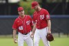 Washington Nationals pitching coach Jim Hickey, left, talks with pitcher Stephen Strasburg, right, as Strasburg throws live batting practice during the team's spring training baseball workout, Tuesday, March 15, 2022, in West Palm Beach, Fla. (AP Photo/Sue Ogrocki)
