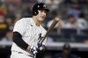 FILE - New York Yankees' Anthony Rizzo watches his two-run single during the second inning of the team's baseball game against the Boston Red Sox on Aug. 18, 2021, in New York. Rizzo is staying with the Yankees, agreeing Tuesday night, March 15, to a $32 million, two-year contract, a person familiar with the negotiations told The Associated Press. The person spoke on condition of anonymity because the agreement was subject to a successful physical. (AP Photo/Adam Hunger, File)