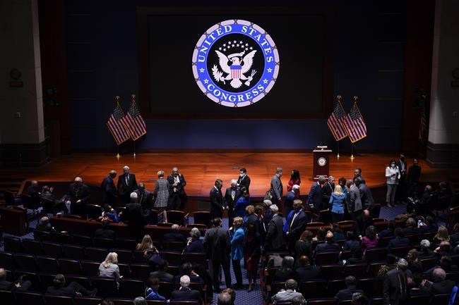 Senate Minority Leader Mitch McConnell of Ky., center, and others arrive to hear Ukrainian President Volodymyr Zelenskyy speak to the U.S. Congress by video at the Capitol in Washington, Wednesday, March 16, 2022. (AP Photo/J. Scott Applewhite, Pool)