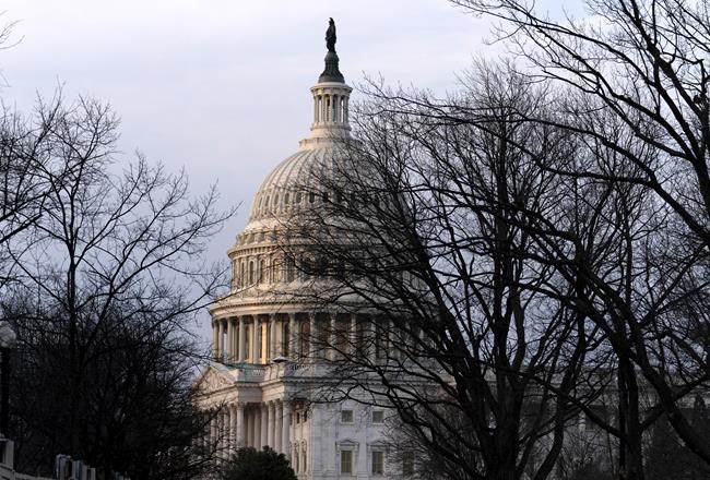 The U. S. Capitol is seen at sunrise in Washington, Wednesday, March 16, 2022. Ukraine President Volodymyr Zelenskyy will virtually address the U.S. Congress Wednesday morning. ( AP Photo/Jose Luis Magana)