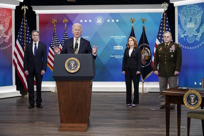 President Joe Biden speaks about additional security assistance that his administration will provide to Ukraine in the South Court Auditorium on the White House campus in Washington, Wednesday, March 16, 2022. From left, Secretary of State Antony Blinken, Biden, Deputy Secretary of Defense Kathleen Hicks and Chairman of the Joint Chiefs of Staff General Mark Milley. (AP Photo/Patrick Semansky)