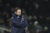 Everton's head coach Frank Lampard watches play during the English Premier League soccer match between Tottenham Hotspur and Everton at Tottenham Hotspur Stadium in London, Monday, March 7, 2022. (AP Photo/Ian Walton)