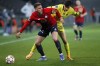 Lille's Sven Botman, left, and Chelsea's Kai Havertz fight for the ball during the Champions League, second leg, round of 16, soccer match between Lille and Chelsea at the Stade Pierre Mauroy stadium in Villeneuve d'Ascq, northern France, Wednesday, March 16, 2022. (AP Photo/Michel Spingler)
