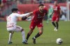 Toronto FC's Jonathan Osorio, right, tries to go past New York Red Bulls' Frankie Amaya first half MLS action in Toronto, Saturday, March 5, 2022. THE CANADIAN PRESS/Chris Young