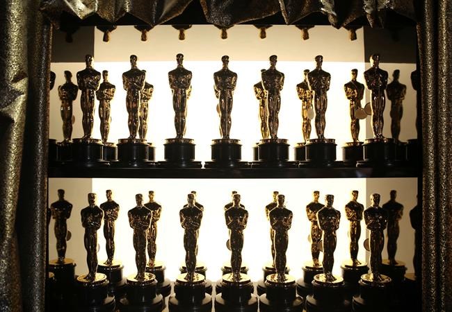 FILE - Oscar statuettes appear backstage at the Oscars at the Dolby Theatre in Los Angeles on Feb. 28, 2016. The Oscars will be held on Sunday, March 27 at the Dolby Theatre in Los Angeles. The ceremony is set to begin at 8 p.m. ET and will be broadcast live on ABC. (Photo by Matt Sayles/Invision/AP, File)