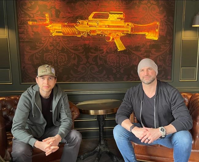 Retired squadron commander Glenn Cowan, right, and one of Shopify Inc.'s co-founders, Daniel Weinand, are seen in an undated handout photo. Cowan and Weinand have teamed up to launch a venture capital fund aimed at financing national security companies. THE CANADIAN PRESS/HO-Renley Cowan, *MANDATORY CREDIT*