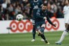 PSG's Lionel Messi makes an attempt to score during the French League One soccer match between Paris Saint-Germain and Bordeaux at the Parc des Princes stadium in Paris, France, Sunday, March 13, 2022. (AP Photo/Thibault Camus)