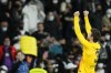 Barcelona's Gerard Pique celebrates end of the Spanish La Liga soccer match between Rial Madrid and FC Barcelona at the Santiago Bernabeu stadium in Madrid, Spain, Sunday, March 20, 2022. Barcelona won 4-0. (AP Photo/Manu Fernandez)