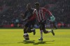 Manchester City's Gabriel Jesus, left, and Southampton's Kyle Walker-Peters vie for the ball during the English FA Cup soccer match between Southampton and Manchester City at St Mary's stadium in Southampton, England, Sunday, March 20, 2022. (AP Photo/Alastair Grant)