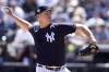 New York Yankees starting pitcher Jameson Taillon throws during the first inning of a spring training baseball game against the Philadelphia Phillies, Monday, March 21, 2022, in Tampa, Fla. (AP Photo/Lynne Sladky)