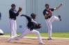 Atlanta Braves pitchers Alex Jackson, left, Jasseel De La Cruz, center, and Kyle Muller warm up during spring training at the CoolToday Park, Monday, March 14, 2022, in North Port, Fla. (AP Photo/Steve Helber)