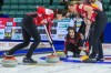 Canada skip Kerri Einarson yells directions while third Val Sweeting, left, and lead Briane Meilleur sweep in front of a stone entering the house at CN Centre on Monday afternoon during at the Women's World Curling in Prince George, B.C., Monday, March 21, 2022.&nbsp;Einarson feels her team is adjusting to the new 