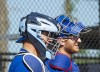 Toronto Blue Jays catchers Reese McGuire, left, and Danny Jansen watch the action during a spring training workout Thursday, March 17, 2022, in Dunedin, Fla.&nbsp;Before newly signed free agents Kevin Gausman and Yusei Kikuchi arrived at Blue Jays spring training, Toronto catchers Danny Jansen, Reese McGuire and Alejandro Kirk were already reviewing video of the pitchers.&nbsp;THE CANADIAN PRESS/Mark Taylor