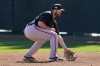 San Francisco Giants' Darian Ruf runs drills during spring training baseball workouts, Tuesday, March 15, 2022, in Scottsdale, Ariz. (AP Photo/Matt York)
