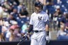 New York Yankees' Aaron Judge walks to the dugout after striking out swinging during the first inning of a spring training baseball game against the Detroit Tigers, Sunday, March 20, 2022, in Tampa, Fla. (AP Photo/Lynne Sladky)