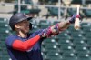 Minnesota Twins' Carlos Correa adjusts his arm protector during batting batting practice at Hammond Stadium Wednesday March 23, 2022, in Fort Myers, Fla. (AP Photo/Steve Helber)