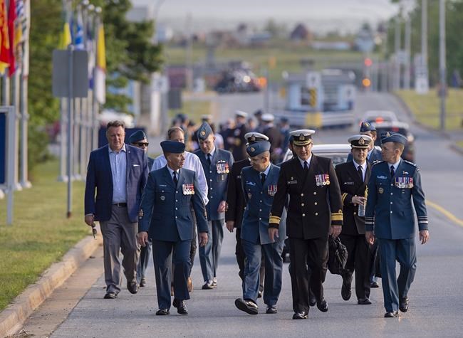 Senior military officers and dignitairies depart after attending the homecoming motorcade procession for the return of Capt. Brenden MacDonald, Capt. Maxime Miron-Morin and Master Cpl. Matthew Cousins, drives through 12 Wing Shearwater near Dartmouth, N.S. on Thursday, June 25, 2020. The Canadian Armed Forces will soon adopt a gender-neutral dress code for service member as military commanders push for more diversity in the ranks. THE CANADIAN PRESS/Andrew Vaughan