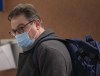 Former journalist Jonah Keri arrives for his sentencing on assault charges at the courthouse, Wednesday, March 23, 2022 in Montreal. The ex-sportswriter has been sentenced to 21 months for repeated abuse against his former spouse. THE CANADIAN PRESS/Ryan Remiorz