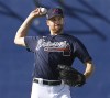 Atlanta Braves newly signed pitcher Collin McHugh loosens up at baseball spring training in North Port, Fla., Thursday, March 17, 2022. (Curtis Compton/Atlanta Journal-Constitution via AP)