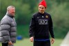 FILE - Manchester United's manager Alex Ferguson, left, is seen with striker Dimitar Berbatov as the team train at Carrington training ground the day before their Champions League semi-final soccer match against Arsenal in Manchester, England, Tuesday April 28, 2009. Dimitar Berbatov’s curiosity about leadership was sparked by seeing the books in his the office of Manchester United manager Alex Ferguson. A biography of Napoleon Bonaparte made an impression on one of Bulgaria’s greatest forwards. Berbatov is now leading a campaign to become president of his national soccer federation. (AP Photo/Jon Super, file)