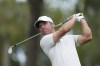 Paul Casey, of England, hits from the sixth tee during the final round of play in The Players Championship golf tournament Monday, March 14, 2022, in Ponte Vedra Beach, Fla. (AP Photo/Lynne Sladky)