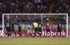Canada's goalkeeper Milan Borjan, center, eyes the ball as Costa Rica's Celso Borges scores a goal during a World Cup qualifying soccer match in San Jose, Costa Rica, Thursday, March 24, 2022. THE CANADIAN PRESS/AP-Carlos Gonzalez