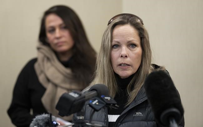 Tamara Lich, organizer for a protest convoy by truckers and supporters demanding an end to COVID-19 vaccine mandates, delivers a statement during a news conference in Ottawa, Thursday, Feb. 3, 2022. Counsel for convoy organizer Tamara Lich says she will appeal the bail conditions imposed on her. THE CANADIAN PRESS/Adrian Wyld