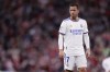 FILE - Real Madrid's Eden Hazard reacts during their Spanish La Liga soccer match against Athletic Bilbao at the San Mames stadium in Bilbao, Spain, Dec. 22, 2021. Real Madrid on Friday, March 25, 2022 said Eden Hazard will undergo surgery to remove a plate in his right leg. The 31-year-old Hazard has played sparingly for Madrid this season. The surgery will rule him out from facing former club Chelsea next month in the Champions League. (AP Photo/Ricardo Larreina, file)