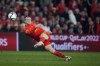 Wales' Gareth Bale takes a shot during the World Cup 2022 playoff soccer match between Wales and Austria at Cardiff City stadium, in Cardiff, Britain, Thursday, March 24, 2022. (AP Photo/Matt Dunham)