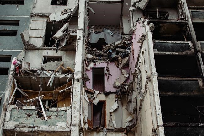 A view of a residential building damaged by shelling, in Chernihiv, Ukraine, Wednesday, March 9, 2022. (AP Photo/Yuriy Vasilenko)