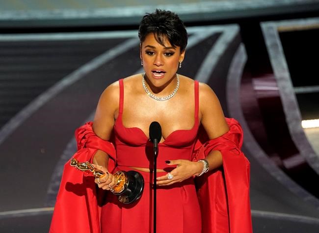 Ariana DeBose accepts the award for best performance by an actress in a supporting role for