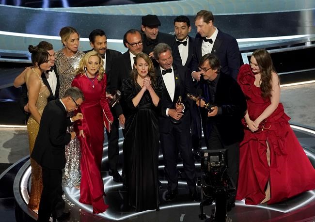 The cast and crew of
