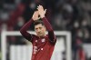 Bayern's Robert Lewandowski celebrates after the German Bundesliga soccer match between FC Bayern Munich and 1 FC Union Berlin at the Allianz Arena in Munich, Germany, Saturday, March 19, 2022. (AP Photo/Andreas Schaad)