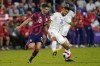 United States' Christian Pulisic (10) and Panama's Andres Andrade (16) battle for possession of the ball during the second half of a FIFA World Cup qualifying soccer match, Sunday, March 27, 2022, in Orlando, Fla. (AP Photo/John Raoux)