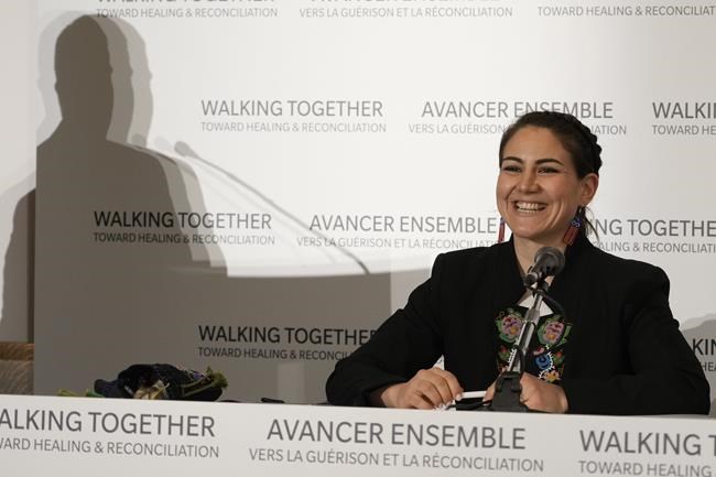 The President of the Metis community, Cassidy Caron, talks to journalists after meeting with Pope Francis in Rome, Monday, March 28, 2022. Indigenous leaders from Canada and survivors of the country's notorious residential schools met with Pope Francis on Monday and told him of the abuses they suffered at the hands of Catholic priests and school workers, in hopes of securing a papal apology from him and a commitment by the church to repair the harm done. (AP Photo/Gregorio Borgia)