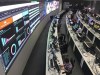 People work in the command center in that will be at the heart of World Cup operations in Doha, Qatar, Monday, March 28, 2022. All is quiet and calm now. By November, this command center will be at the heart of World Cup operations. The Associated Press has had a first look inside one of the key locations overseeing security and logistics for the most high-profile sporting event to be staged in the Middle East. (AP Photo/Rob Harris)